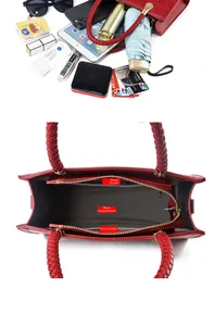 Detailed view of the red handbag's large interior capacity with crocodile pattern