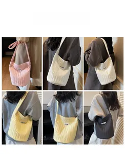 Detailed views of pleated bucket bags in multiple colors with Love label showing fit