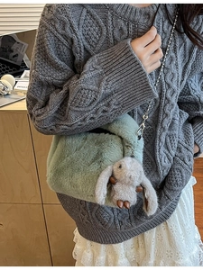 Fuzzy light green plush crossbody bag with bunny pendant and silver chain strap