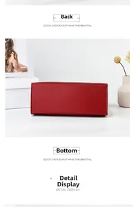 Detailed view of the flat bottom structure and crocodile texture on this red handbag