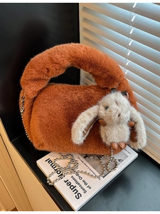 Plush orange faux fur crossbody bag with cute rabbit pendant and metal chain strap