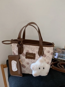 Large capacity cartoon cat print tote bag with adjustable brown strap and plush star charm