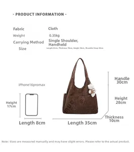 Guide des tailles du sac cabas marron 35x10x28cm avec comparaison d'échelle iPhone