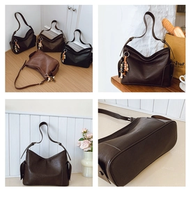 Detail von Vintage-Schultertaschen aus PU-Leder in Dunkelbraun, Schwarz und Karamell