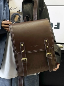 Retro brown leather backpack with buckle straps and contrast stitching for women
