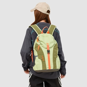 Detail of lightweight green outdoor backpack with orange straps on a female model