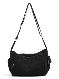 Large black nylon crossbody travel bag with multi-pocket storage and adjustable strap