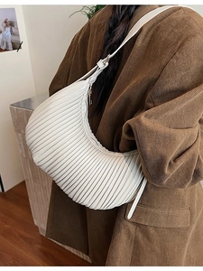 Chic off-white pleated crescent moon crossbody bag with adjustable strap for women