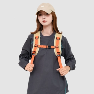 Detail of outdoor backpack chest strap with quick release buckle and padded shoulder mesh