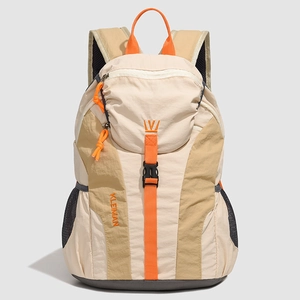 Front view of a lightweight outdoor backpack in beige and khaki with orange details