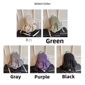 Selection of colorful nylon backpacks in white green purple grey and black colors