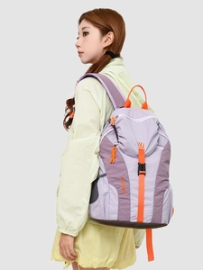 Lightweight purple lavender travel backpack for women with stylish orange contrast details