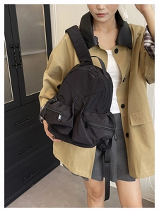 Waterproof black nylon casual backpack with multiple zipper pockets for daily outdoor travel