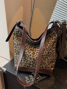 Fashion leopard print bucket bag with brown leather trim and dual straps for women
