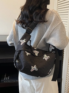 Black large capacity canvas crossbody bag with colorful butterfly embroidery details