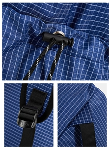 Detail of blue grid pattern fabric with adjustable drawstring cord and plastic buckle