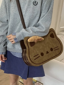 Cute caramel toast cat-shaped crossbody bag with plaid fabric side and plush croissant charm