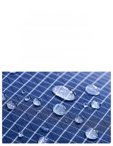 Macro shot of high-density blue checkered fabric with superior waterproof coating