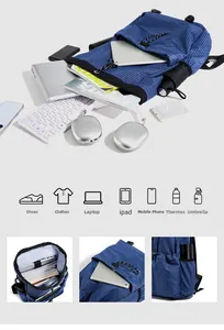 Macro detail of blue checkered drawstring backpack showing organized interior compartments