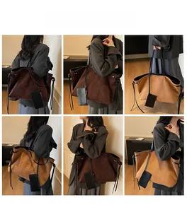 Dettagli della borsa tote vintage in pelle opaca nei colori marrone scuro e caramello