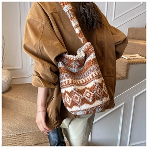 Detail showing the thick plush texture and geometric rhombus pattern of the bucket bag