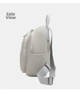 Side view of lightweight nylon backpack featuring multi-layer zip pockets and adjustable straps