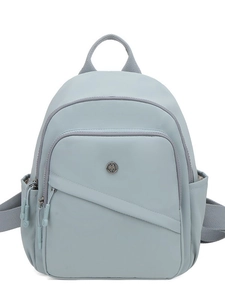 Lightweight mint blue washed nylon backpack with front pocket and metal M logo