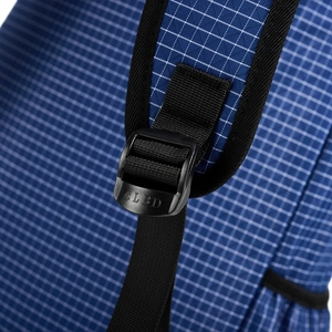 Detail of blue grid nylon fabric with adjustable buckle and durable shoulder strap