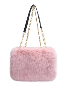 Pink faux fur tote bag with golden metal chain strap and soft plush texture