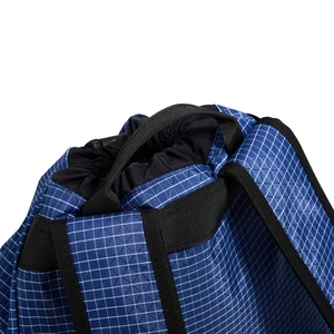 Detail of blue grid drawstring bag showing durable top handle and nylon straps