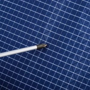 Macro shot of dark blue plaid tear-resistant fabric showing durable outdoor weave