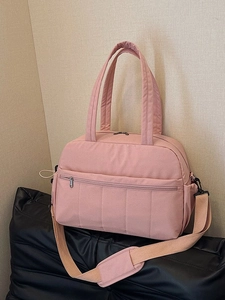 Pink large capacity travel duffel bag with crossbody strap and multi-pocket design
