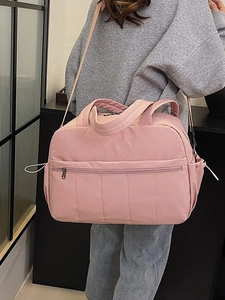 Pink large capacity travel bag for women with adjustable straps and multiple pockets