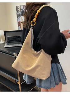 Retro khaki hobo shoulder bag with wooden bead strap and soft suede finish