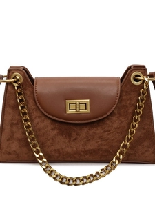 Vintage brown leather and suede crossbody bag with gold chain strap on white background