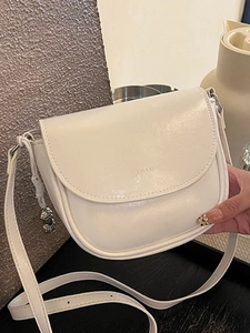 Minimalist PU Leather Crossbody Saddle Bag For Women With Peanut Metal Pendant Trendy Horseshoe Flap Shoulder Purse Commute Bag