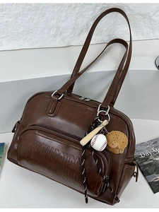 Retro dark brown PU leather tote bag with embossed letters and baseball charms on white