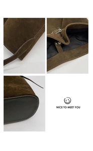 Détails du sac seau en daim marron avec surpiqûres blanches et boucle métallique chic