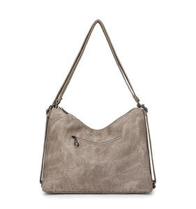 Rear view of grey canvas bag showing zipper pocket and adjustable strap functionality