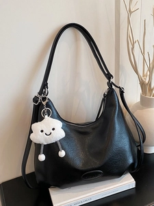 Retro black crescent shoulder bag in soft leather with cute cloud pendant and adjustable strap