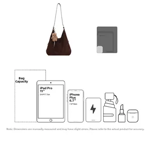 Detail showing high-capacity interior of brown suede tote bag with tablet and phone guides