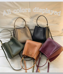 All colors displayed: large capacity bucket bags in five retro tones with pebble leather