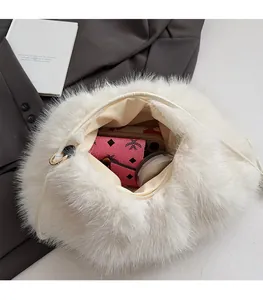 Interior view of the white faux fur tote bag showing large capacity for essentials