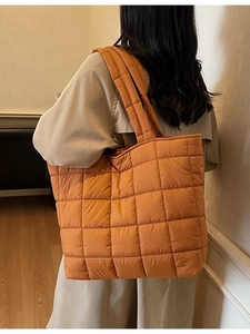 Quilted nylon tote bag in caramel orange with square pattern for autumn and winter