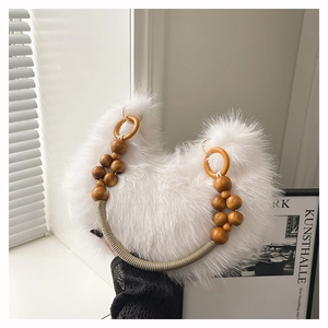 Close-up of white faux fur handbag with unique wooden bead handle and braided rope details