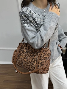 Women's leopard print tote bag with brown leather straps and vintage canvas finish