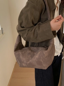 Large suede hobo bag in dark brown with minimalist shoulder strap for casual commute