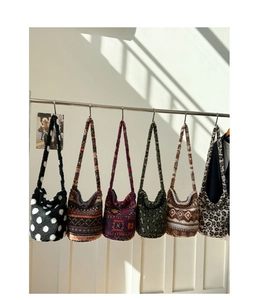 Detailed display of plush lamb wool bucket bags in various patterns and colors