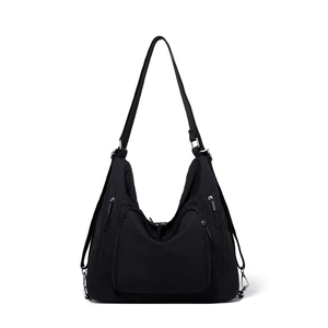 Detail of waterproof black nylon hobo bag featuring silver hardware and adjustable strap