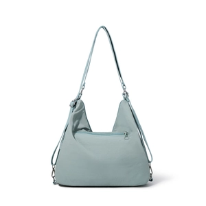Detailed view of the light blue nylon tote bag showing front zipper and strap buckles